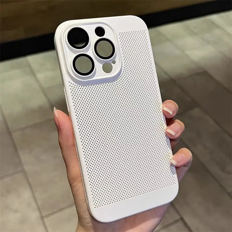 a person holding a white iphone case