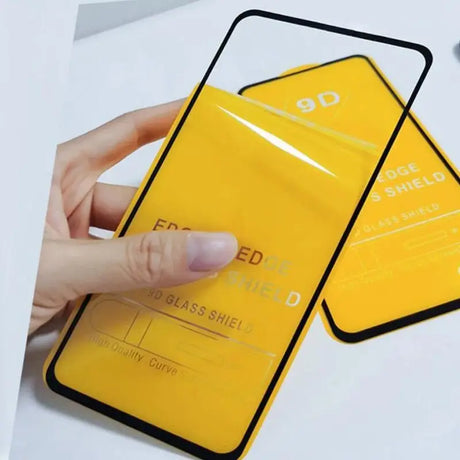 a person holding a yellow phone with a white screen