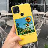 a person holding up a yellow phone case with a sunflower on it