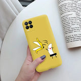 a person holding a yellow phone case with a cartoon character on it