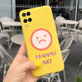 a person holding up a yellow phone case