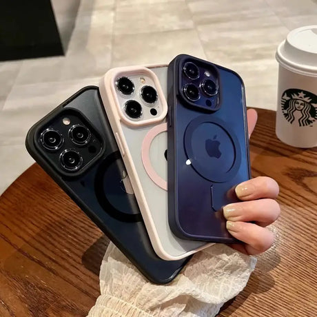 A person holding an iphone case with a starbucks cup in the background