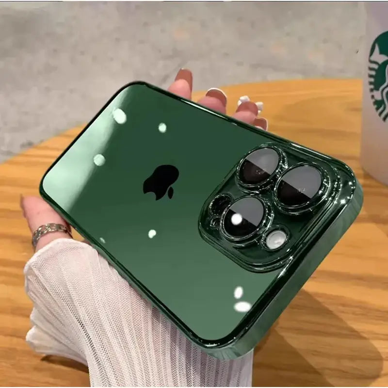 a person holding an iphone with a green case