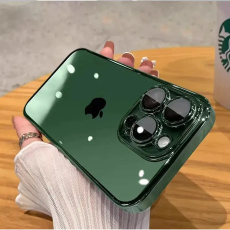 A person holding an iphone with a green case