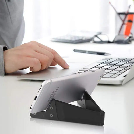 a person using a keyboard on a desk