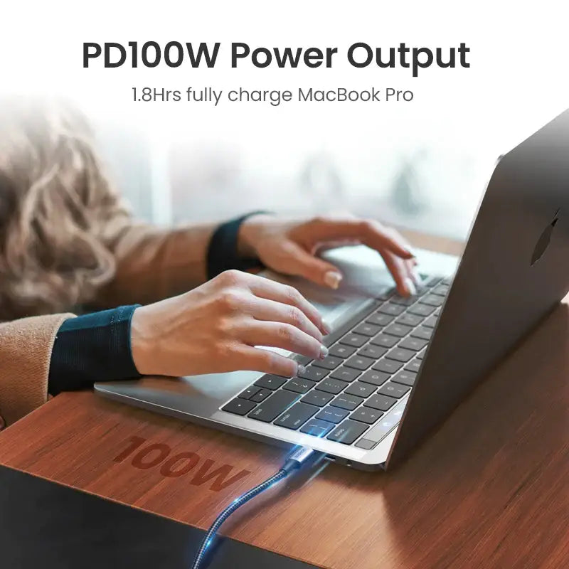 A person typing on a laptop with the text pdow power output
