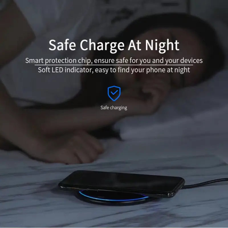 a person laying on a bed with a phone