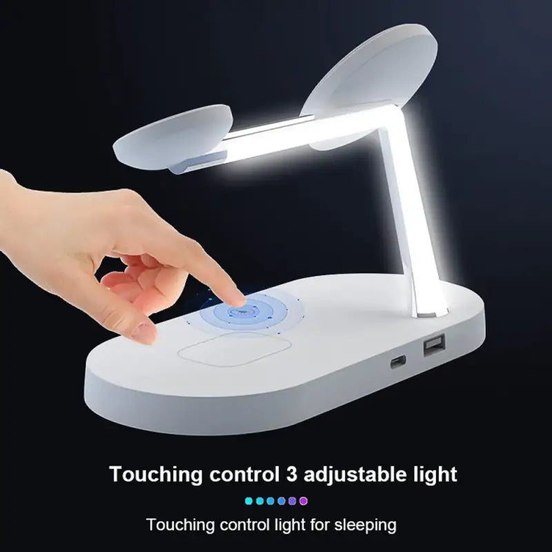 a person touching a light on a table