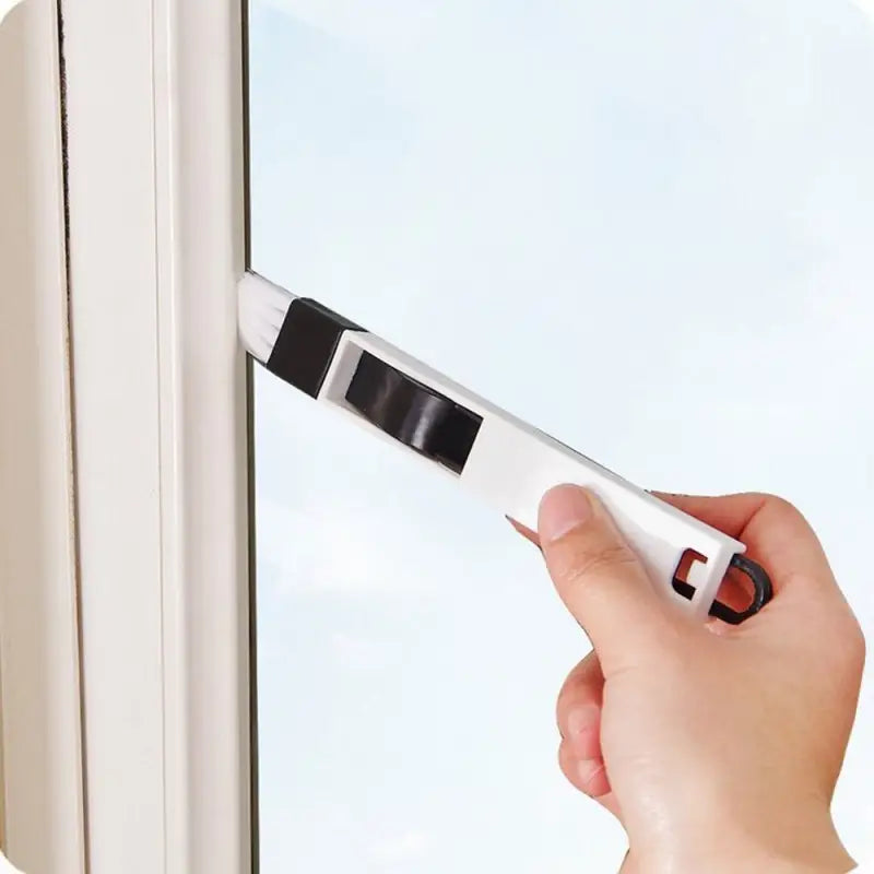 a person is holding a window opener