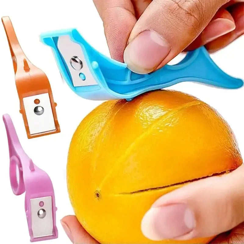 a person is peeling an orange with a knife