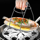 a person is holding a frying pan with fish