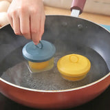 a person is cooking a pan with a sauce