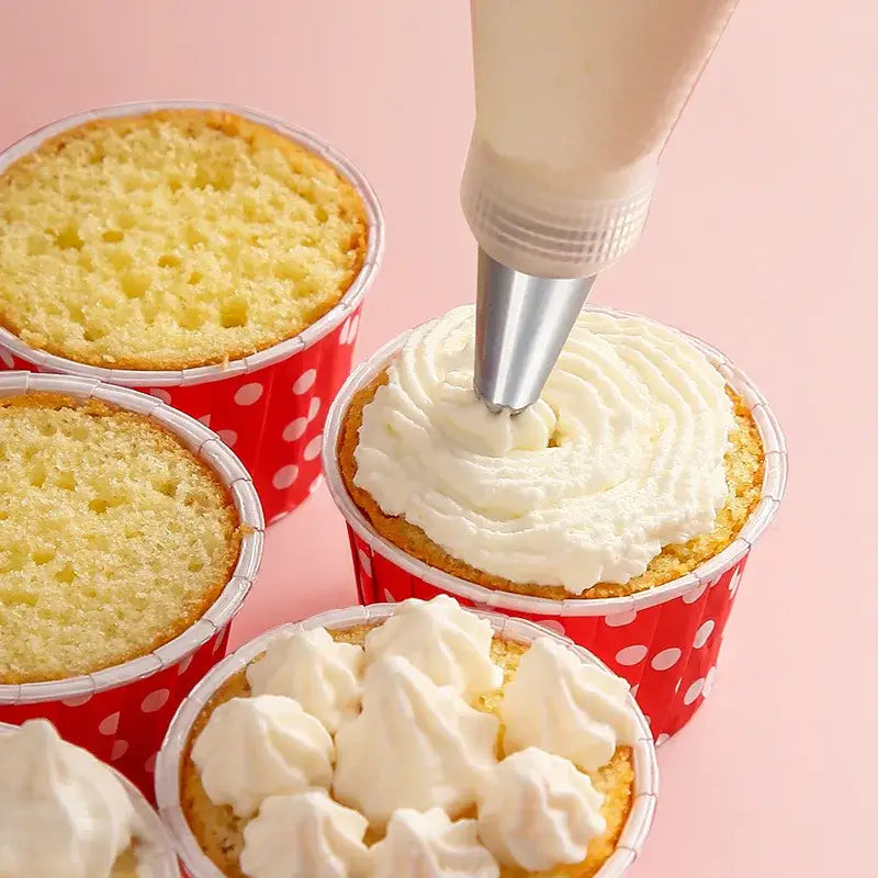 a person is using a pastry cutter to make cupcakes