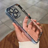 A person holding a phone with a camera