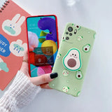 a person holding a phone case with a book