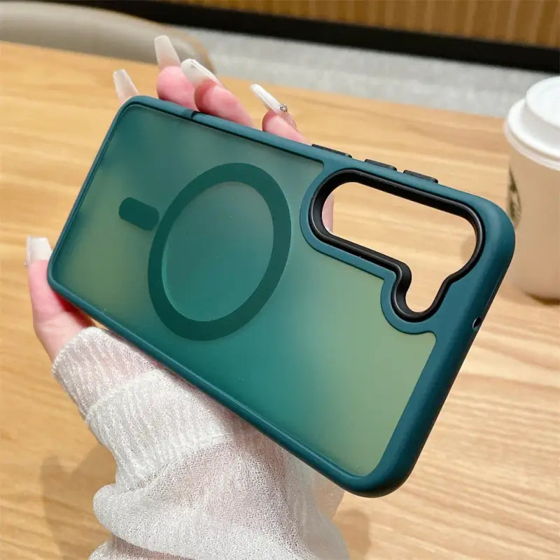 a person holding a phone case with a camera