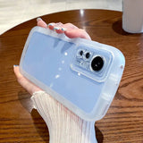 a person holding a phone case with a camera