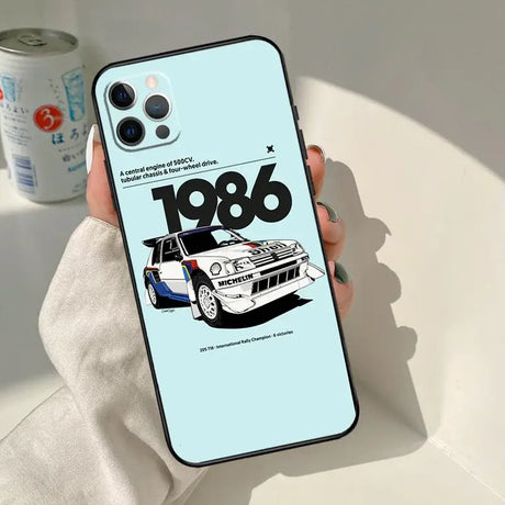 A person holding a phone case with a car on it