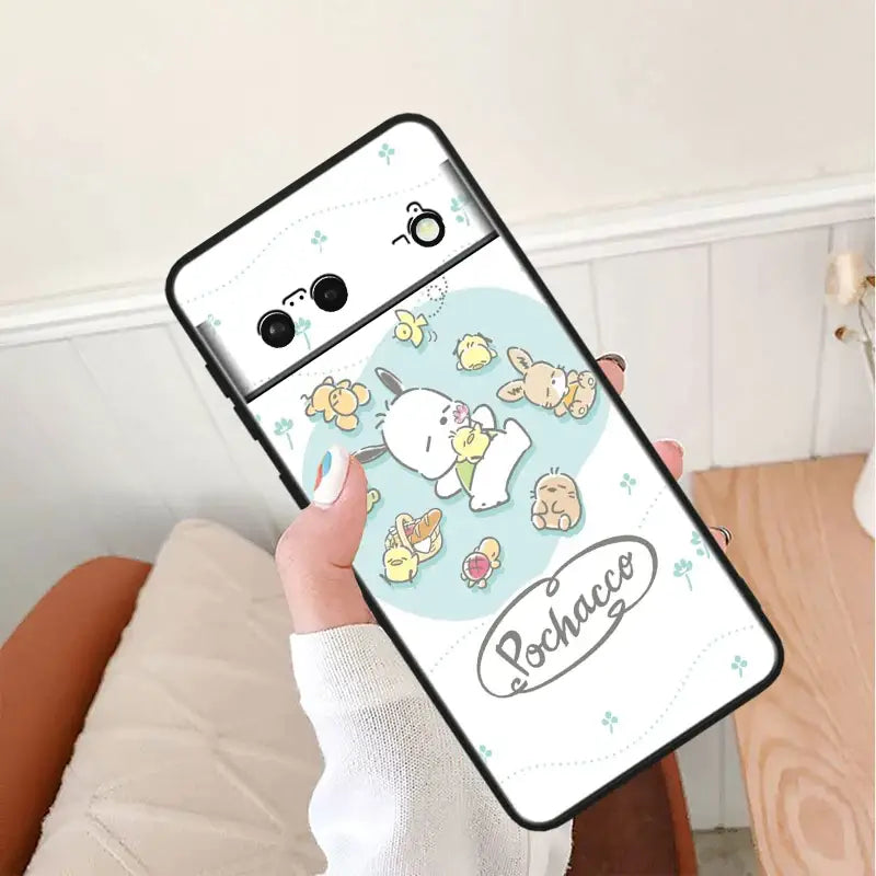 a person holding a phone case with a cartoon character