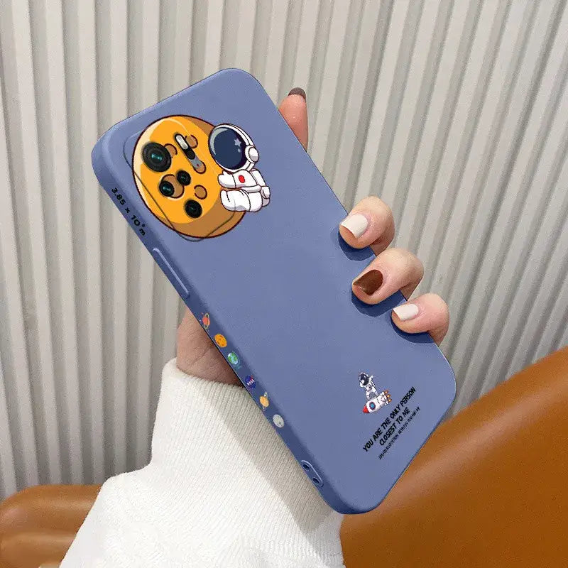 a person holding a phone case with a cartoon character on it