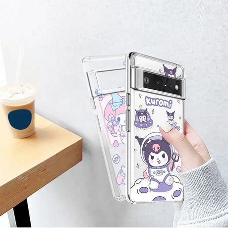 A person holding a phone case with a cartoon character design