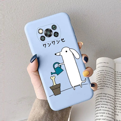 a person holding a phone case with a cartoon character