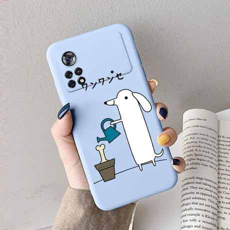 A person holding a phone case with a cartoon character