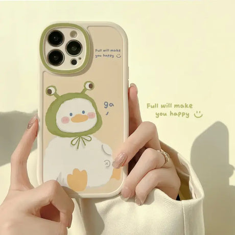 A person holding a phone case with a cartoon character on it