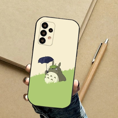 A person holding a phone case with a cartoon character