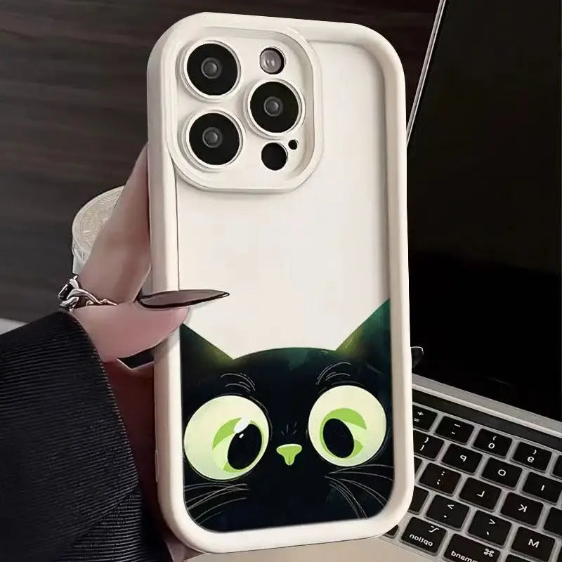 A person holding a phone case with a cat on it