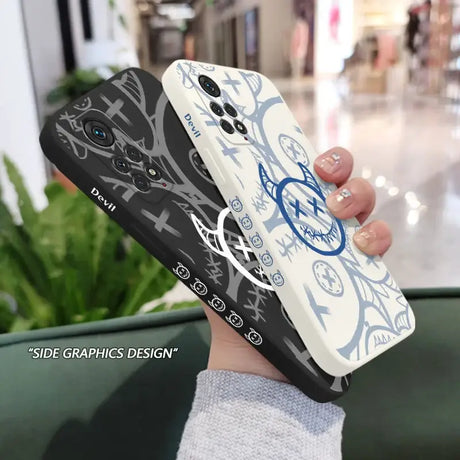 A person holding a phone case with a design on it