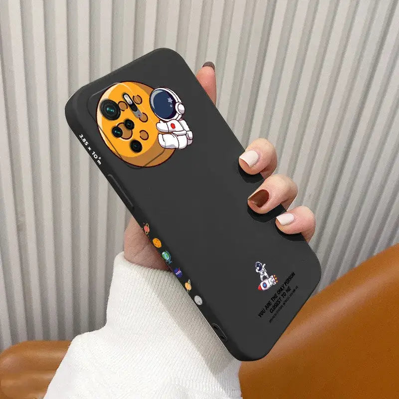 a person holding a phone case with a dog face on it