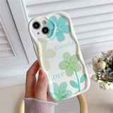 a person holding a phone case with flowers on it