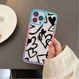a person holding a phone case with graffiti on it