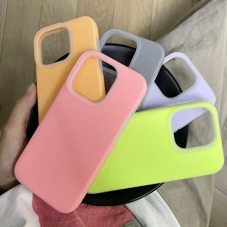 A person holding a phone case in their hand