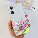 a person holding a phone case with a painting of a train