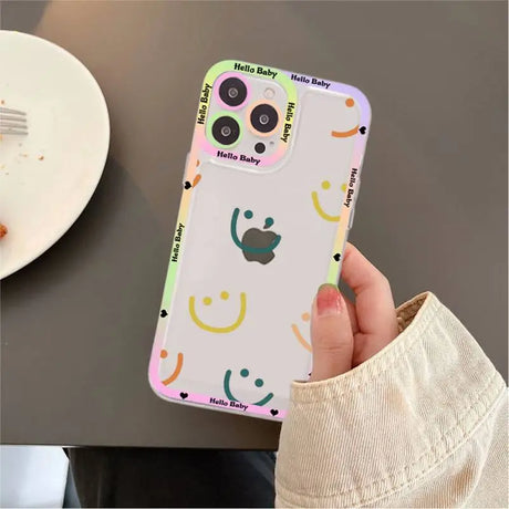 A person holding a phone case with a pattern on it