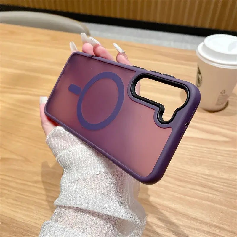 a person holding a phone case with a purple phone
