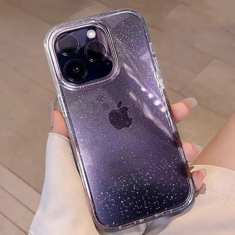 A person holding a phone case with a starr pattern