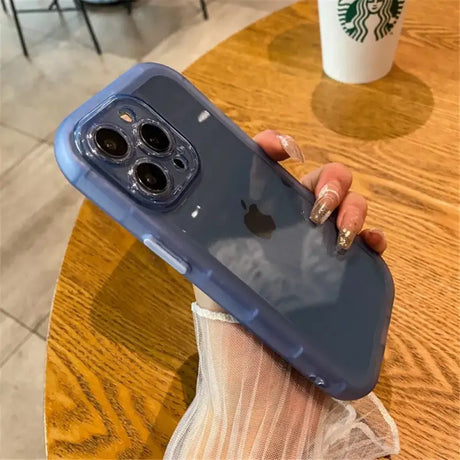 A person holding a phone in their hand