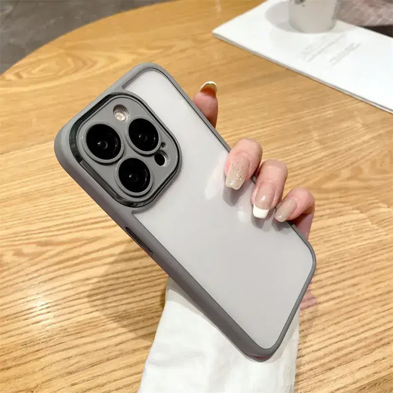 a person holding a phone in their hand
