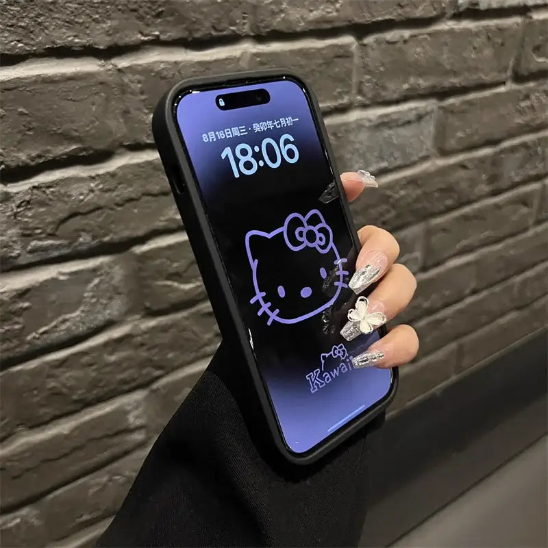 A person holding a phone with a hello kitty on it