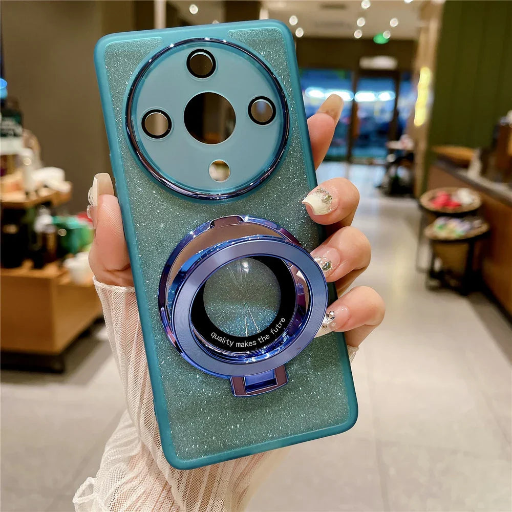 a person holding a phone with a ring on it