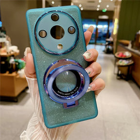 a person holding a phone with a ring on it