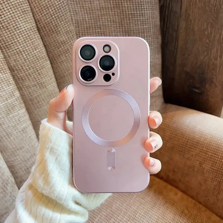 A person holding a pink iphone case