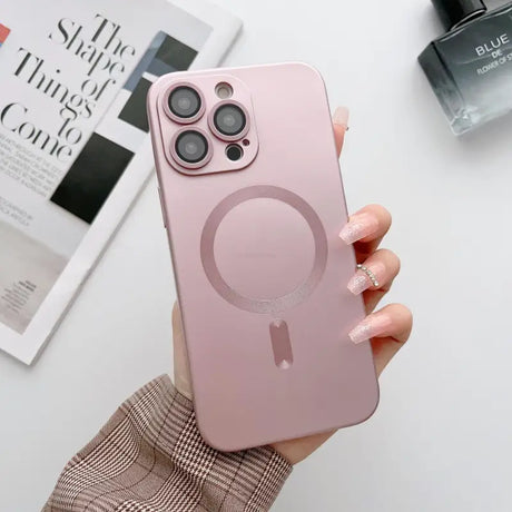 A person holding a pink iphone case