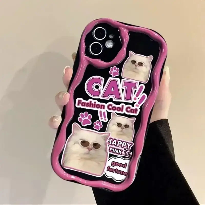 a person holding a pink phone case with a cat on it