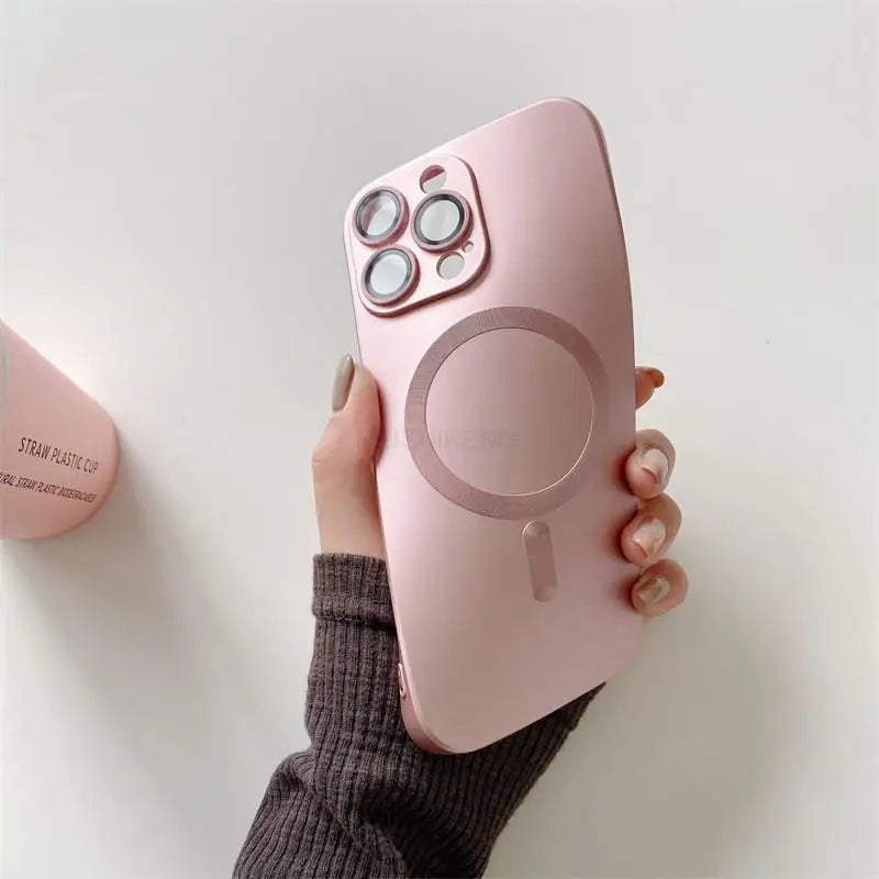 a person holding a pink phone case