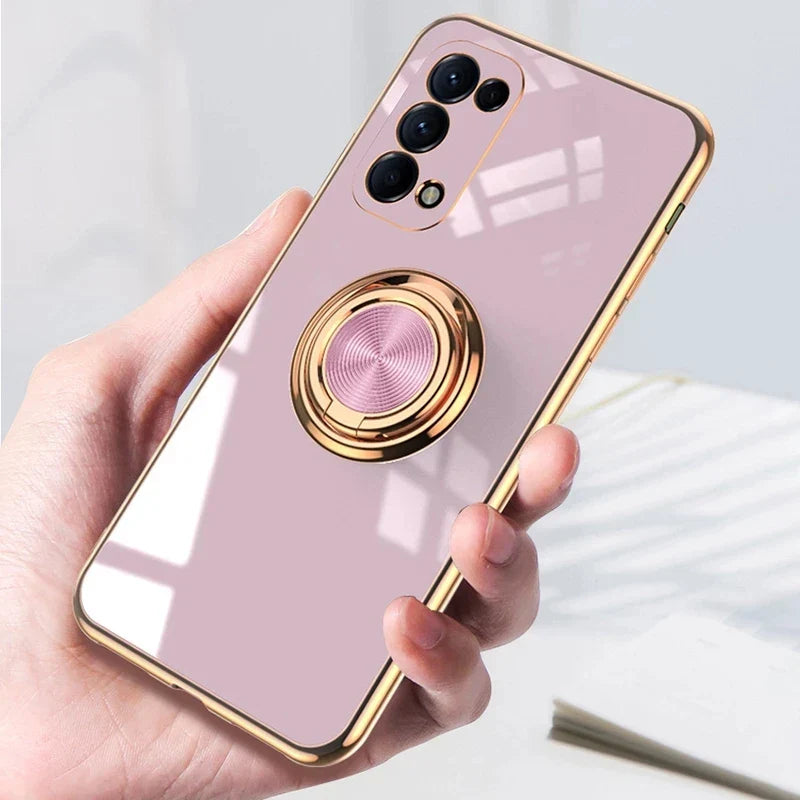 a person holding a pink phone with a gold ring