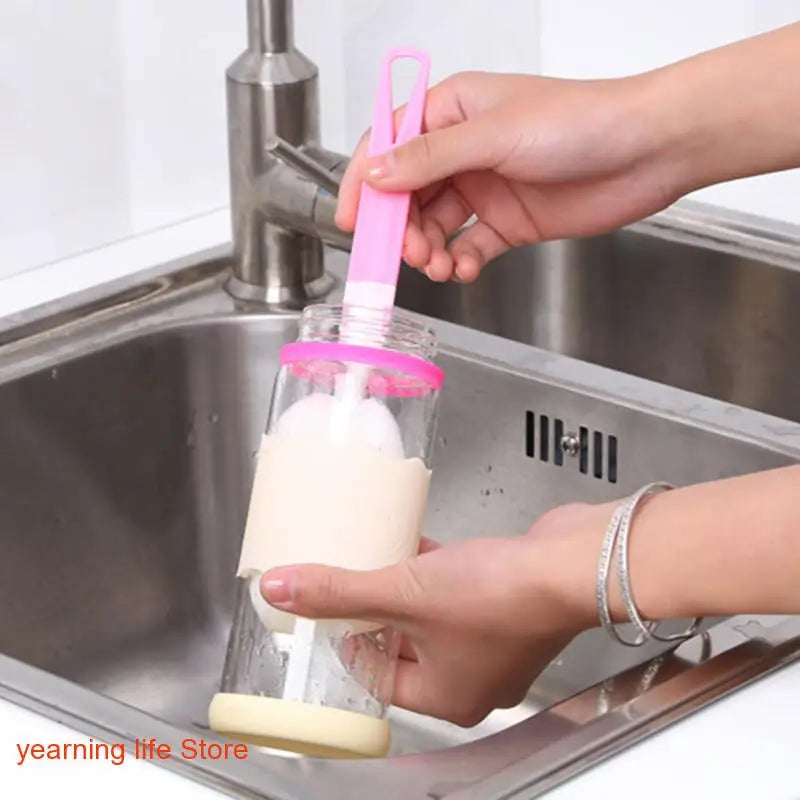a person is pouring milk into a bottle